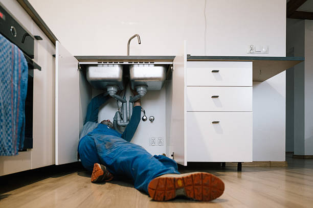 Professional Drain Cleaning technician working in Spiro, OK
